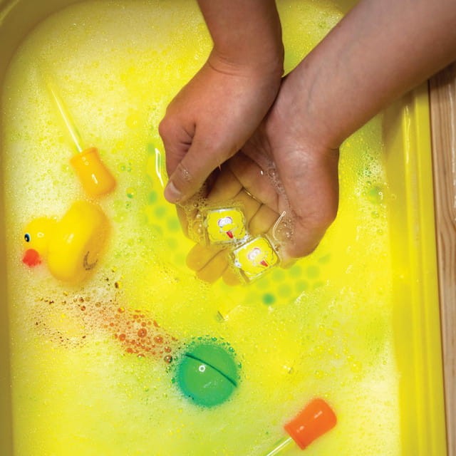 Glo Pals, Kostki sensoryczne świecące w wodzie Wielki Ptak Ulica Sezamkowa - zabawka kąpielowa 